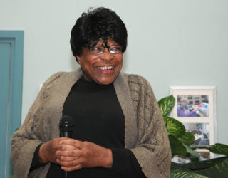 Evelyn Martin with microphone